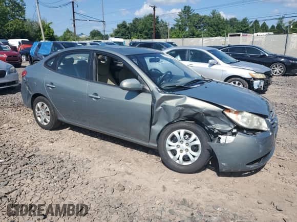 2010 Hyundai Elantra GLS z VIN KMHDU4AD7AU830625, wystawiony jako Copart lot #66755534 z przebiegiem Nie podano mil oraz Szkoda całkowita • Salvage title. Historia ofert i sprzedaży dostępna na DreamBid. Obrazek 4.
