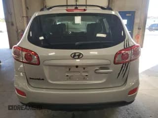 ✅ 2012 Hyundai Santa Fe GLS • VIN: 5XYZG3AB9CG118681 • Lot: 77802964. Listed on Copart with 140,465 mi. Free auction sales archive from the USA and detailed vehicle history report at DreamBid. Image 6.