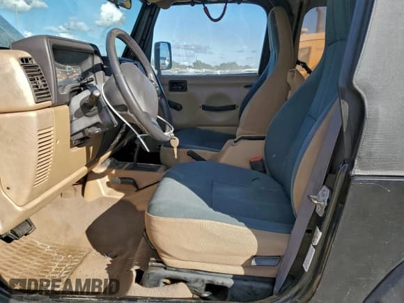 ✅ 2002 Jeep Wrangler Sahara • VIN: 1J4FA59SX2P739910 • Lot: 94188655. Listed on Copart with 109,888 mi. Free auction sales archive from the USA and detailed vehicle history report at DreamBid. Image 7.