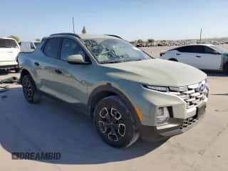 2022 Hyundai Santa Cruz SEL z VIN 5NTJCDAE0NH039356, wystawiony jako Copart lot #76769524 z przebiegiem 17 247 mil mil oraz Szkoda całkowita • Salvage title. Historia ofert i sprzedaży dostępna na DreamBid. Obrazek 4.