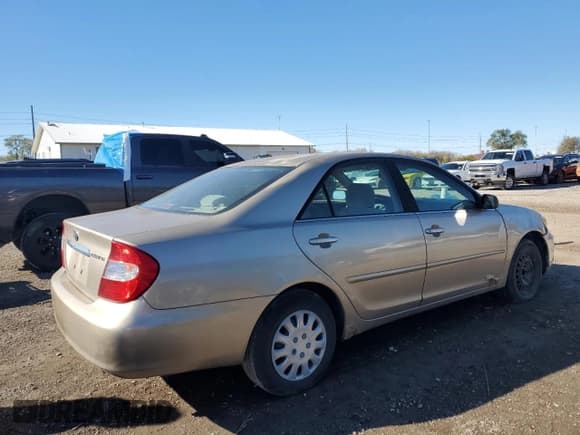 ✅ 2002 Toyota Camry LE • VIN: JTDBE32K520020340 • Lot: 91112395. Listed on Copart with 140,537 mi. Free auction sales archive from the USA and detailed vehicle history report at DreamBid. Image 3.