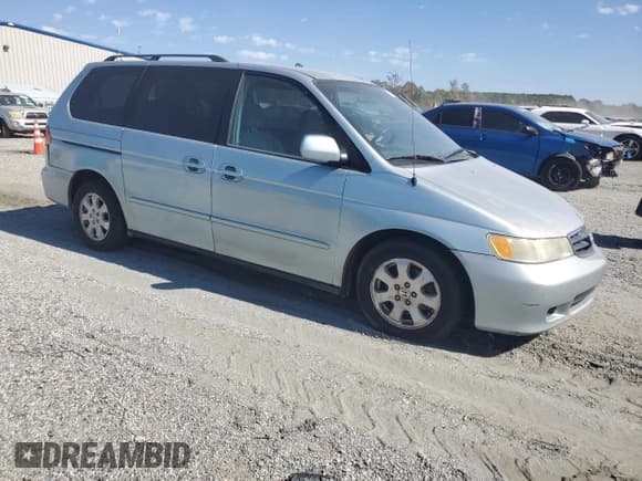 ✅ 2003 Honda Odyssey EX • VIN: 2HKRL18633H501095 • Lot: 87459365. Listed on Copart with 308,205 mi. Free auction sales archive from the USA and detailed vehicle history report at DreamBid. Image 4.
