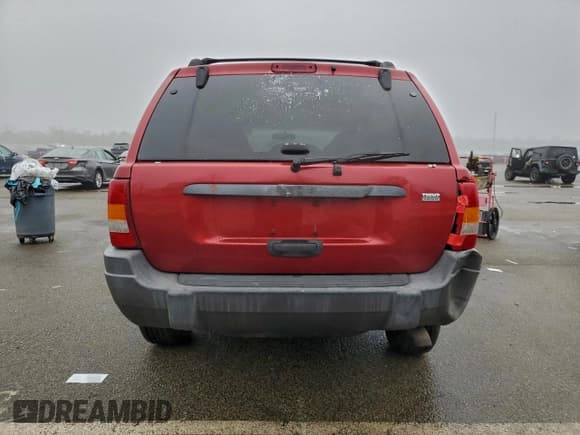 ✅ 2004 Jeep Grand Cherokee Laredo • VIN: 1J4GW48N94C420908 • Lot: 94174445. Listed on Copart with 179,751 mi. Free auction sales archive from the USA and detailed vehicle history report at DreamBid. Image 6.