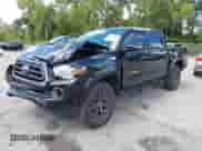 2022 Toyota Tacoma SR5 with VIN 3TMAZ5CN4NM164094, listed as a IAAI auction lot 43409274 with 38,585 mi miles and . Bid and sale history available at DreamBid. Image 2.