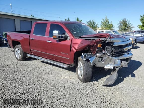 ✅ 2015 Chevrolet Silverado 2500HD LTZ • VIN: 1GC1KWE85FF622390 • Lot: 68325495. Listed on Copart with 119,183 mi. Free auction sales archive from the USA and detailed vehicle history report at DreamBid. Image 4.