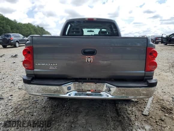 2006 Dodge Dakota SLT с VIN 1D7HE48K06S522552, выставлен на аукционе Copart как лот 67614475 с пробегом 208 801 миль миль и Списание • Salvage title. История ставок и продаж доступна на DreamBid. Изображение 6.