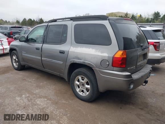 ✅ 2006 GMC Envoy SLE • VIN: 1GKES16SX66100812 • Lot: 41878711. Listed on IAAI with 158,809 mi. Free auction sales archive from the USA and detailed vehicle history report at DreamBid. Image 3.