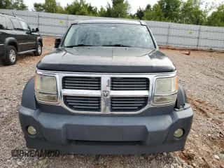 2007 Dodge Nitro SXT с VIN 1D8GU28K27W601732, выставлен на аукционе Copart как лот 72654904 с пробегом 123 249 миль миль и Списание • Salvage title. История ставок и продаж доступна на DreamBid. Изображение 5.