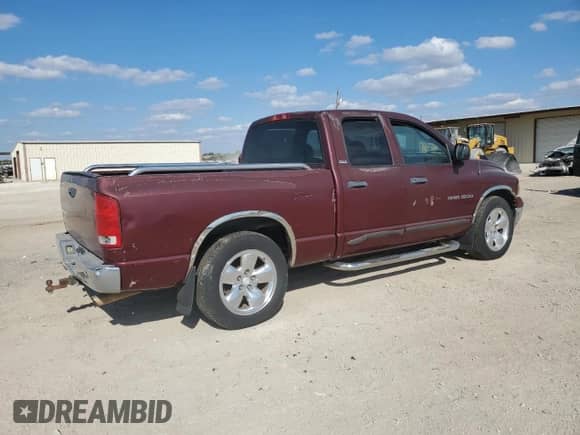 2002 Dodge 1500 z VIN 3D7HA18Z72G208132, wystawiony jako Copart lot #87273125 z przebiegiem 155 201 mil mil oraz Czysty tytuł • Clean title. Historia ofert i sprzedaży dostępna na DreamBid. Obrazek 3.