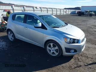 ✅ 2013 Chevrolet Sonic LTZ • VIN: 1G1JE6SB2D4104651 • Lot: 41803945. Wystawiony na IAAI z przebiegiem 132 337 mil mil. Skorzystaj z bezpłatnego archiwum sprzedaży aukcyjnych z USA i zobacz szczegółowy raport historii pojazdu na DreamBid. Zdjęcie 1.