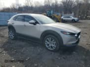 ✅ 2022 Mazda CX-30 S Premium • VIN: 3MVDMBDL0NM429048 • Lot: 45460745. Wystawiony na Copart z przebiegiem 28 905 mil. Bezpłatny archiwum sprzedaży aukcyjnych z USA i szczegółowy raport historii pojazdu na DreamBid. Zdjęcie 4.
