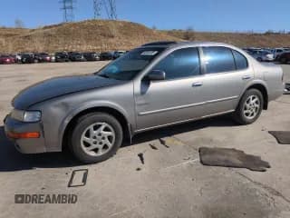 ✅ 1999 Nissan Maxima GXE • VIN: JN1CA21A9XT707073 • Лот: 56646505. Опубликован ранее на Copart с пробегом 149 873 миль. Бесплатный доступ к архиву аукционных продаж из США и подробный отчёт об истории автомобиля на DreamBid. Изображение 1.