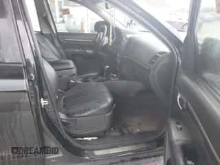 2012 Hyundai Santa Fe Limited z VIN 5XYZK3AB2CG168966, wystawiony jako IAAI lot #43377073 z przebiegiem 172 284 mil mil oraz . Historia ofert i sprzedaży dostępna na DreamBid. Obrazek 5.