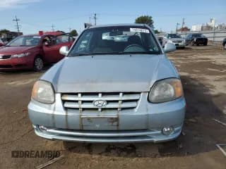 ✅ 2005 Hyundai Accent GLS • VIN: KMHCG35CX5U335873 • Lot: 74374674. Wystawiony na Copart z przebiegiem 91 381 mil. Bezpłatny archiwum sprzedaży aukcyjnych z USA i szczegółowy raport historii pojazdu na DreamBid. Zdjęcie 5.