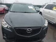 ✅ 2013 Mazda CX-5 Touring • VIN: JM3KE4CE7D0111473 • Lot: 43905917. Listed on IAAI with 222,787 mi. Free auction sales archive from the USA and detailed vehicle history report at DreamBid. Image 12.