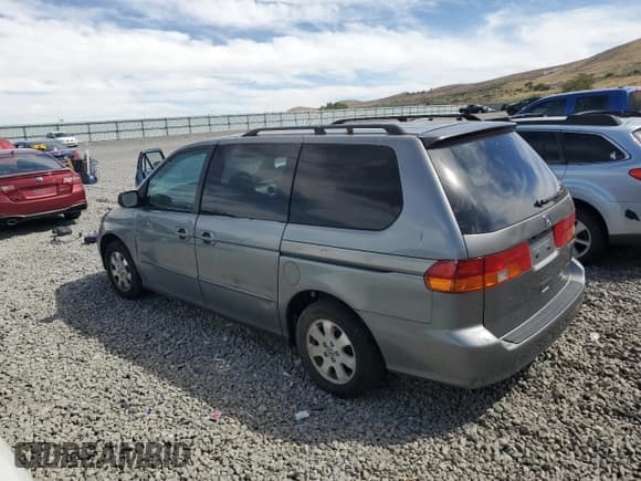 ✅ 2002 Honda Odyssey EX • VIN: 5FNRL18692B020653 • Lot: 69506105. Listed on Copart with 245,074 mi. Free auction sales archive from the USA and detailed vehicle history report at DreamBid. Image 2.