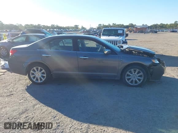 ✅ 2012 Lincoln MKZ • VIN: 3LNHL2JC8CR829204 • Lot: 43696651. Wystawiony na IAAI z przebiegiem 114 339 mil. Bezpłatny archiwum sprzedaży aukcyjnych z USA i szczegółowy raport historii pojazdu na DreamBid. Zdjęcie 13.