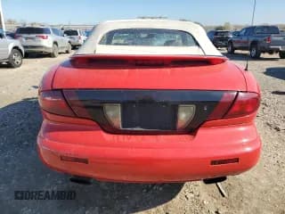 ✅ 1999 Pontiac Sunfire • VIN: 4G2JB32T0XB205150 • Лот: 79254484. Опубликован ранее на Copart с пробегом 107 130 миль. Бесплатный доступ к архиву аукционных продаж из США и подробный отчёт об истории автомобиля на DreamBid. Изображение 6.