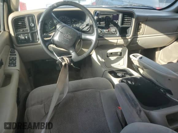 2001 Chevrolet Suburban LS z VIN 3GNEC16T91G243685, wystawiony jako Copart lot #76985874 z przebiegiem Nie podano mil oraz Nie do naprawy • Non repairable. Historia ofert i sprzedaży dostępna na DreamBid. Obrazek 8.