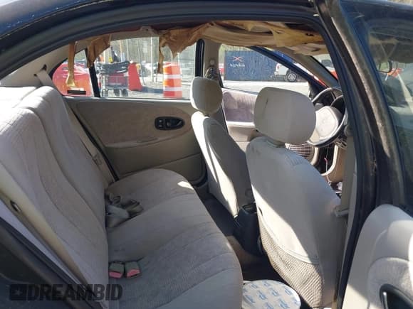 ✅ 1999 Saturn SL • VIN: 1G8ZK5274XZ333729 • Lot: 41987885. Wystawiony na IAAI z przebiegiem Nie podano. Bezpłatny archiwum sprzedaży aukcyjnych z USA i szczegółowy raport historii pojazdu na DreamBid. Zdjęcie 8.