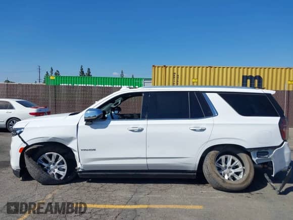 2023 Chevrolet Tahoe Premier z VIN 1GNSKSKD7PR196918, wystawiony jako IAAI lot #43356101 z przebiegiem 13 675 mil mil oraz . Historia ofert i sprzedaży dostępna na DreamBid. Obrazek 14.