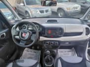 ✅ 2014 FIAT 500L Pop • VIN: ZFBCFAAHXEZ004049 • Лот: 95756405. Опубликован ранее на Copart с пробегом 136 801 миль. Бесплатный доступ к архиву аукционных продаж из США и подробный отчёт об истории автомобиля на DreamBid. Изображение 9.