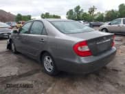 ✅ 2002 Toyota Camry LE • VIN: 4T1BE30K52U561461 • Lot: 43751368. Wystawiony na IAAI z przebiegiem 157 395 mil. Bezpłatny archiwum sprzedaży aukcyjnych z USA i szczegółowy raport historii pojazdu na DreamBid. Zdjęcie 3.