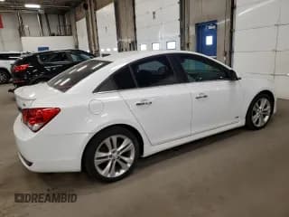 ✅ 2014 Chevrolet Cruze LTZ • VIN: 1G1PG5SB4E7354584 • Lot: 91495615. Listed on Copart with 118,175 mi. Free auction sales archive from the USA and detailed vehicle history report at DreamBid. Image 3.