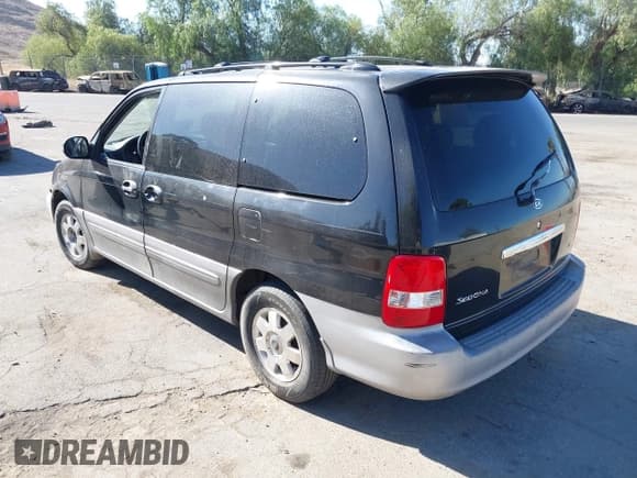 ✅ 2003 Kia Sedona LX • VIN: KNDUP131X36373216 • Lot: 42703440. Wystawiony na IAAI z przebiegiem 174 763 mil. Bezpłatny archiwum sprzedaży aukcyjnych z USA i szczegółowy raport historii pojazdu na DreamBid. Zdjęcie 3.