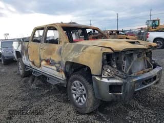 ✅ 2018 Chevrolet Silverado 2500HD LT • VIN: 1GC1KVEY7JF229459 • Lot: 41070959. Listed on IAAI with 116,100 mi. Free auction sales archive from the USA and detailed vehicle history report at DreamBid. Image 1.