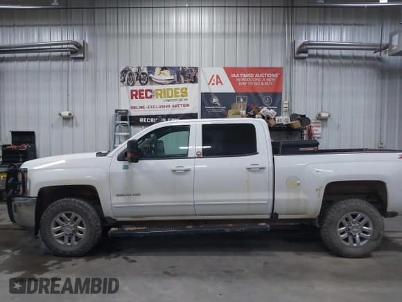 ✅ 2019 Chevrolet Silverado 2500HD LT • VIN: 1GC1KSEG9KF277777 • Лот: 40597481. Опубликован ранее на IAAI с пробегом 105 812 миль. Бесплатный доступ к архиву аукционных продаж из США и подробный отчёт об истории автомобиля на DreamBid. Изображение 14.