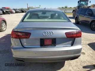 ✅ 2018 Audi A6 Premium Plus • VIN: WAUD8AFC5JN036091 • Лот: 90885665. Опубликован ранее на Copart с пробегом 128 167 миль. Бесплатный доступ к архиву аукционных продаж из США и подробный отчёт об истории автомобиля на DreamBid. Изображение 6.