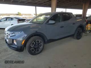 2022 Hyundai Santa Cruz SE with VIN 5NTJADAE7NH009969, listed as a Copart auction lot 42262335 with 25,017 mi miles and Salvage title. Bid and sale history available at DreamBid. Image 1.