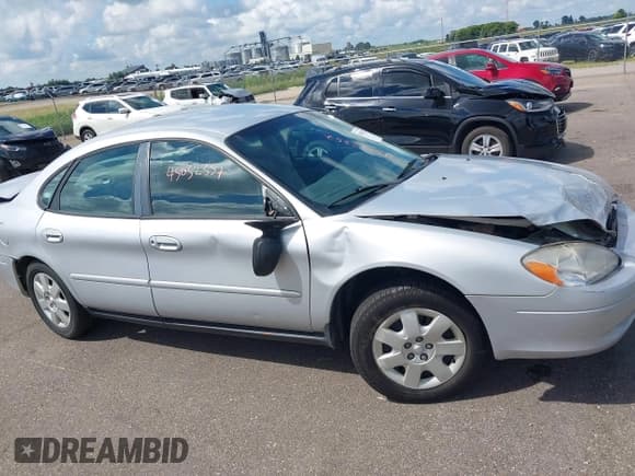 ✅ 2001 Ford Taurus LX • VIN: 1FAFP52U11G202752 • Лот: 43032357. Опубликован ранее на IAAI с пробегом 140 729 миль. Бесплатный доступ к архиву аукционных продаж из США и подробный отчёт об истории автомобиля на DreamBid. Изображение 13.