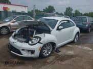 ✅ 2018 Volkswagen Beetle S • VIN: 3VWFD7ATXJM710356 • Lot: 42442969. Listed on IAAI with 52,121 mi. Free auction sales archive from the USA and detailed vehicle history report at DreamBid. Image 2.