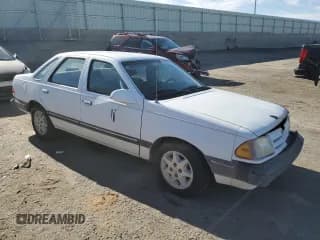 ✅ 1986 Ford Tempo • VIN: 1FABP22X4GK263512 • Lot: 50618855. Wystawiony na Copart z przebiegiem 392 265 mil. Bezpłatny archiwum sprzedaży aukcyjnych z USA i szczegółowy raport historii pojazdu na DreamBid. Zdjęcie 4.