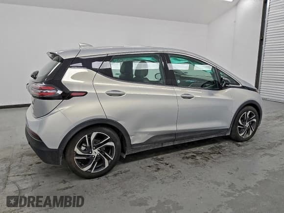 ✅ 2023 Chevrolet Bolt EV 2LT • VIN: 1G1FX6S01P4181224 • Lot: 91563885. Listed on Copart with 70,149 mi. Free auction sales archive from the USA and detailed vehicle history report at DreamBid. Image 3.