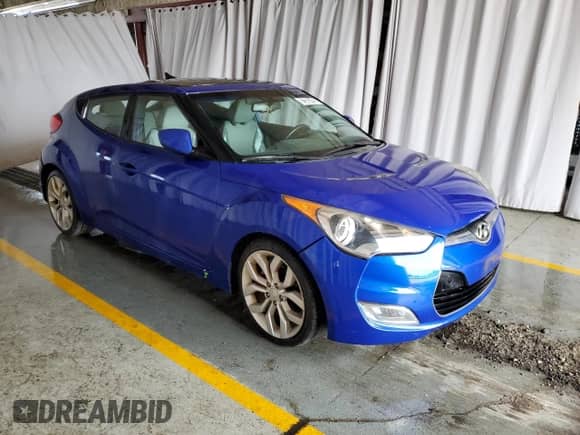 2012 Hyundai Veloster w/Gray Int с VIN KMHTC6AD1CU029296, выставлен на аукционе Copart как лот 62385425 с пробегом 114 520 миль миль и Чистый • Clean title. История ставок и продаж доступна на DreamBid. Изображение 4.