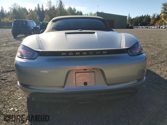 ✅ 2018 Porsche 718 Boxster • VIN: WP0CA2A81JS210302 • Лот: 80034585. Опубликован ранее на Copart с пробегом Не указан. Бесплатный доступ к архиву аукционных продаж из США и подробный отчёт об истории автомобиля на DreamBid. Изображение 6.