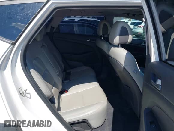 2017 Hyundai Tucson Sport with VIN KM8J33A2XHU548973, listed as a IAAI auction lot 43339444 with 103,873 mi miles and . Bid and sale history available at DreamBid. Image 8.