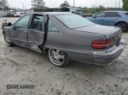 ✅ 1991 Chevrolet Caprice • VIN: 1G1BN53E1MW223013 • Лот: 49857604. Опубликован ранее на Copart с пробегом 224 278 миль. Бесплатный доступ к архиву аукционных продаж из США и подробный отчёт об истории автомобиля на DreamBid. Изображение 2.