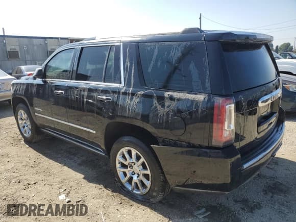✅ 2017 GMC Yukon Denali • VIN: 1GKS1CKJ7HR313281 • Lot: 90091155. Listed on Copart with 136,583 mi. Free auction sales archive from the USA and detailed vehicle history report at DreamBid. Image 2.