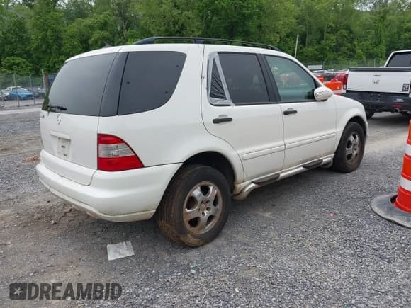 ✅ 2002 Mercedes-Benz M 320/430/500 • VIN: 4JGAB54E82A302467 • Lot: 42287010. Listed on IAAI with 217,505 mi. Free auction sales archive from the USA and detailed vehicle history report at DreamBid. Image 4.