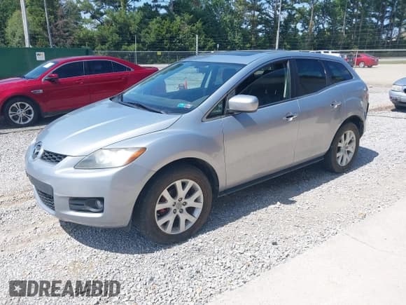 ✅ 2007 Mazda CX-7 Grand Touring • VIN: JM3ER293170140726 • Лот: 43168740. Опубликован ранее на IAAI с пробегом 132 048 миль. Бесплатный доступ к архиву аукционных продаж из США и подробный отчёт об истории автомобиля на DreamBid. Изображение 2.