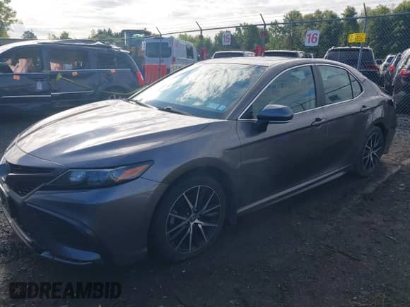 2023 Toyota Camry SE with VIN 4T1T11BK1PU095388, listed as a IAAI auction lot 43074163 with 79,291 mi miles and . Bid and sale history available at DreamBid. Image 2.