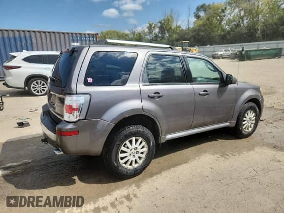 2010 Mercury Mariner Premier с VIN 4M2CN9HG9AKJ15491, выставлен на аукционе Copart как лот 70665985 с пробегом 198 092 миль миль и На запчасти • Non repairable. История ставок и продаж доступна на DreamBid. Изображение 3.