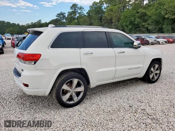 ✅ 2014 Jeep Grand Cherokee Overland • VIN: 1C4RJECG2EC351430 • Лот: 84252665. Опубликован ранее на Copart с пробегом 144 185 миль. Бесплатный доступ к архиву аукционных продаж из США и подробный отчёт об истории автомобиля на DreamBid. Изображение 3.