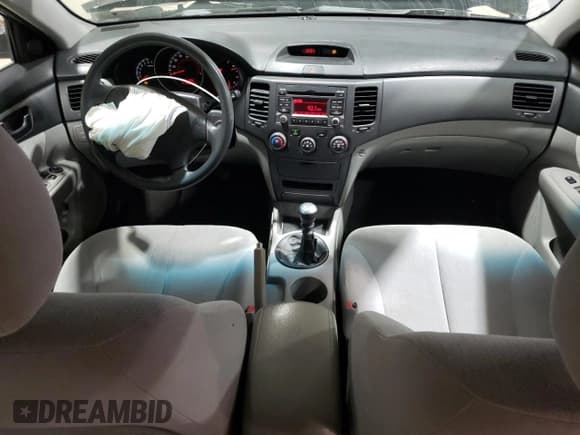 ✅ 2009 Kia Optima LX • VIN: KNAGE228695363723 • Лот: 93146205. Опубликован ранее на Copart с пробегом 186 543 миль. Бесплатный доступ к архиву аукционных продаж из США и подробный отчёт об истории автомобиля на DreamBid. Изображение 8.