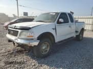 ✅ 2001 Ford F-150 XL • VIN: 2FTRX08LX1CA73596 • Lot: 86841774. Listed on Copart with 262,629 mi. Free auction sales archive from the USA and detailed vehicle history report at DreamBid. Image 1.