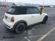 ✅ 2009 MINI Convertible S • VIN: WMWMS33529TG89023 • Lot: 42072518. Listed on IAAI with 127,735 mi. Free auction sales archive from the USA and detailed vehicle history report at DreamBid. Image 4.